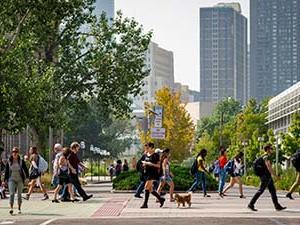 Students walk荷兰国际集团(ing) between classes on Auraria Campus.